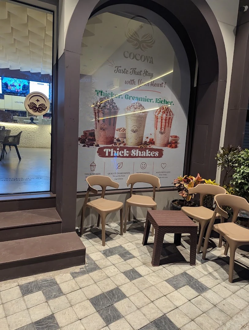 Outside the Cocova cafe with customers enjoying evening