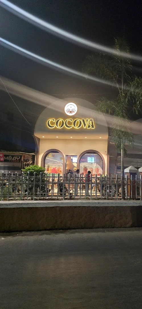 Cocova storefront in Bardoli at twilight