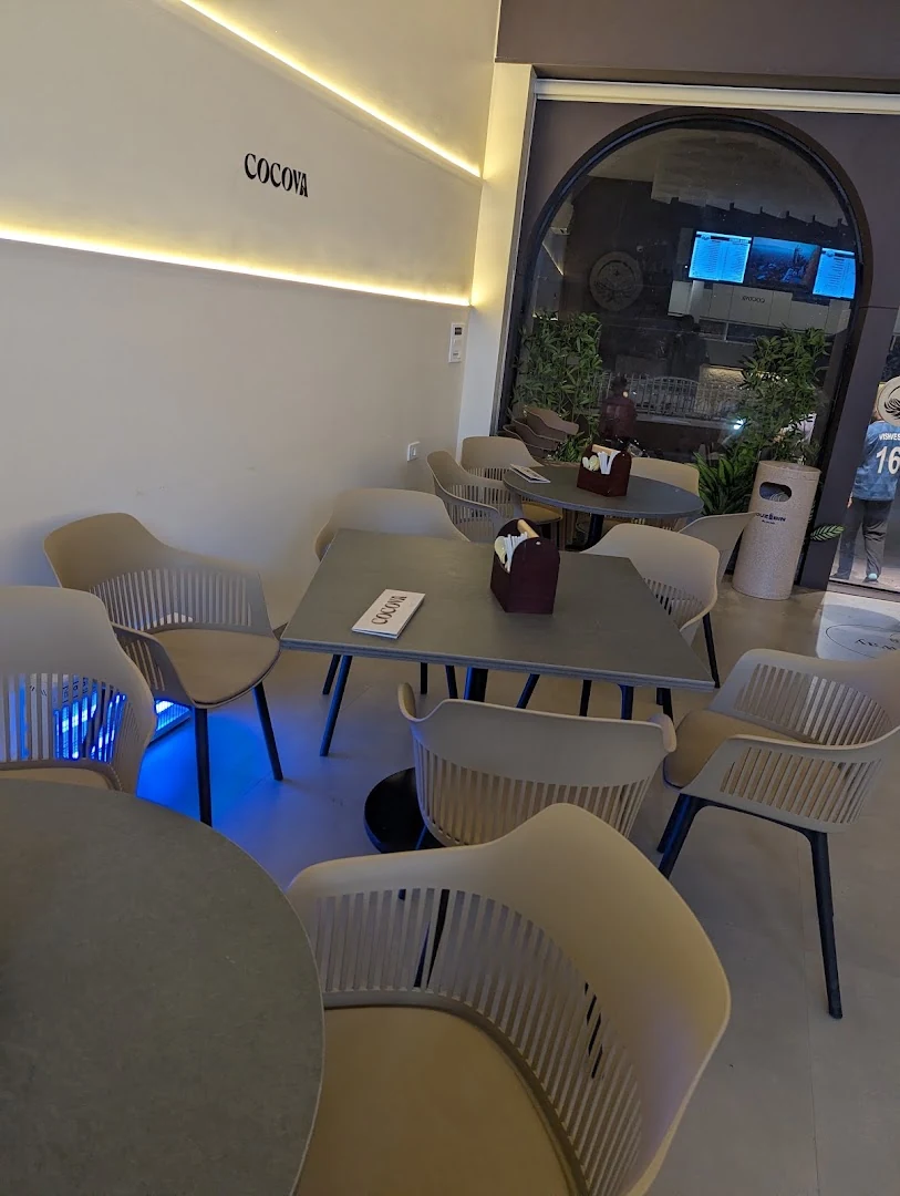 Warm cafe interior with soft architectural arches
